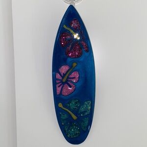 Vibrant Hibiscus Flowers in a Surfboard that is Handmade Resin Art